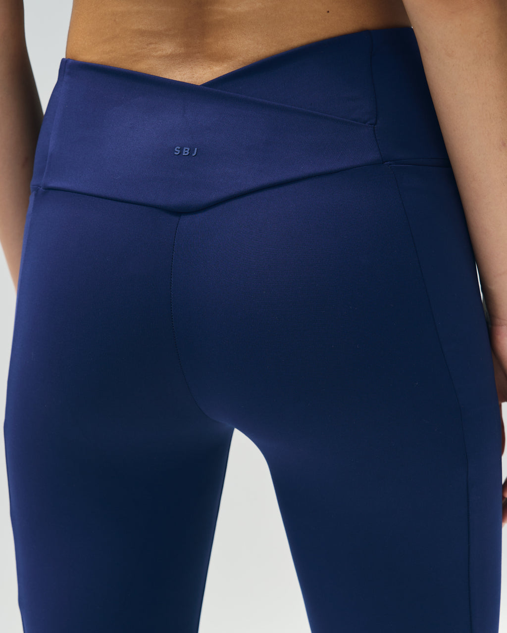 High-Rise Crossback Flare Trousers