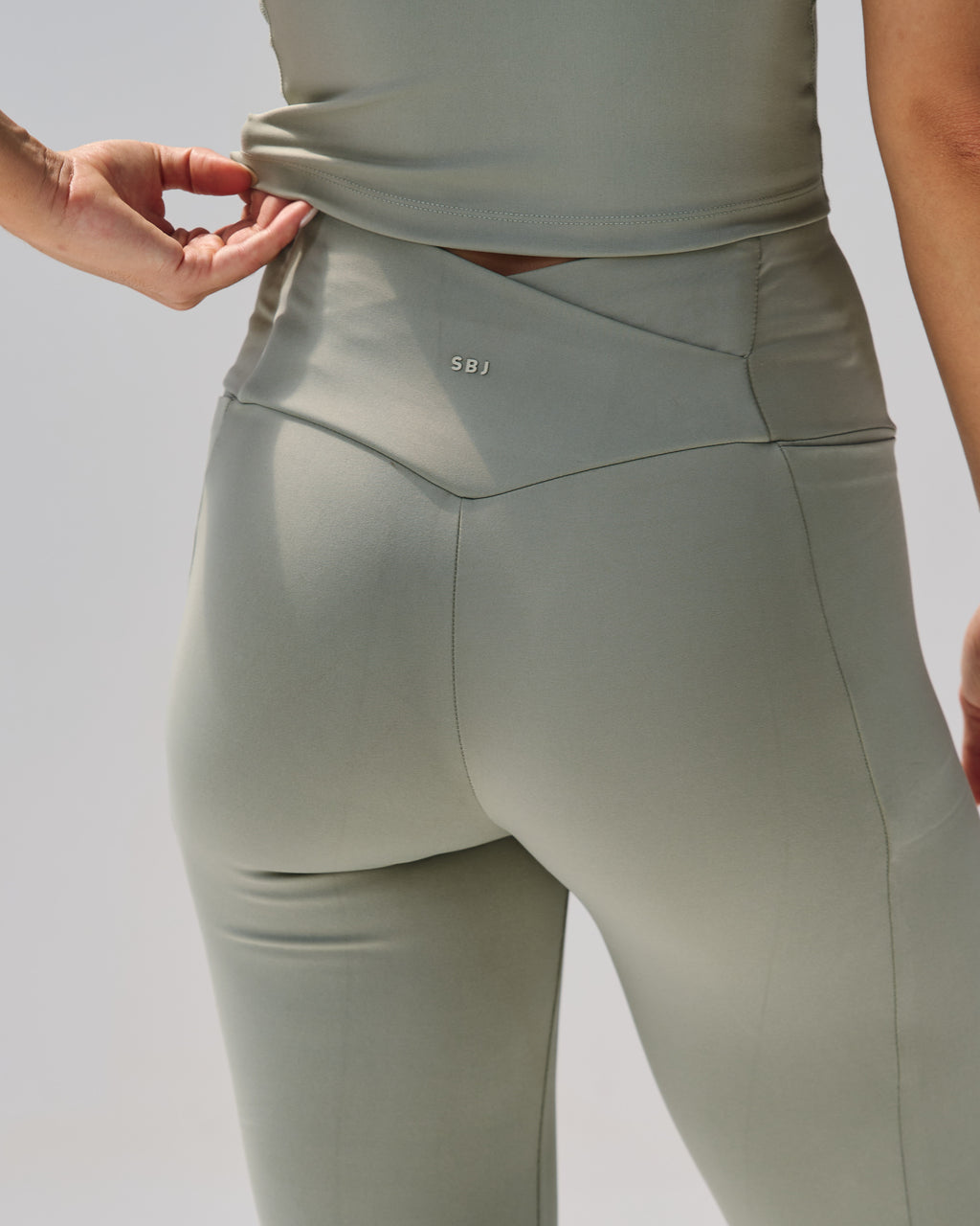 High-Rise Crossback Flare Trousers